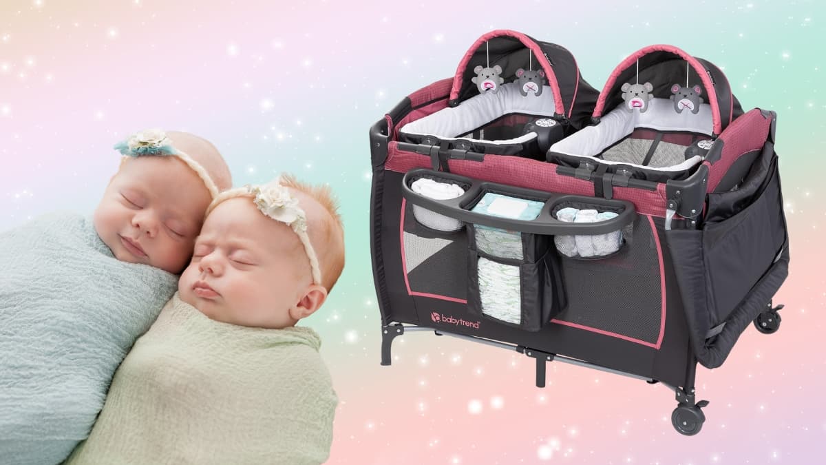 Two sleeping babies next to a Baby Trend Twins Playard in cozy berry color with bassinets and storage.