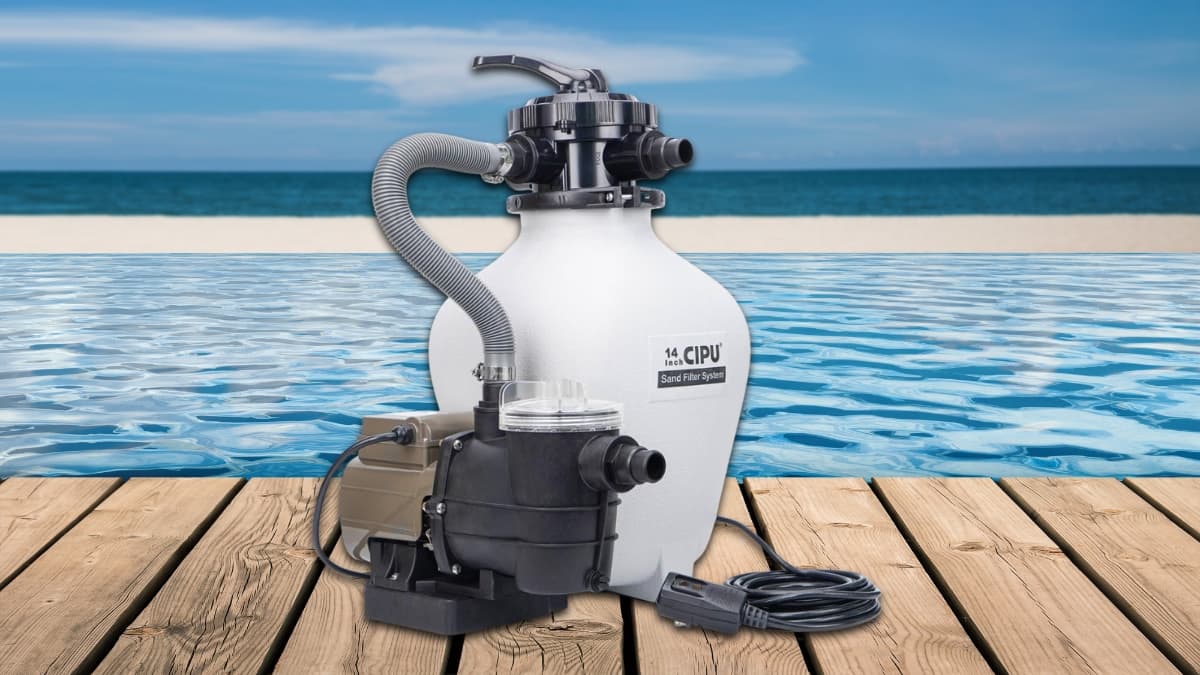 CIPU 14 inch sand filter pump system shown by a clear blue pool on a wooden deck.