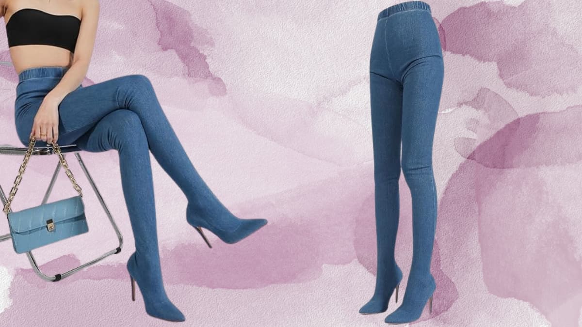 Woman wearing blue HwwDoren pull on legging boots with stiletto heels against a pink textured background.