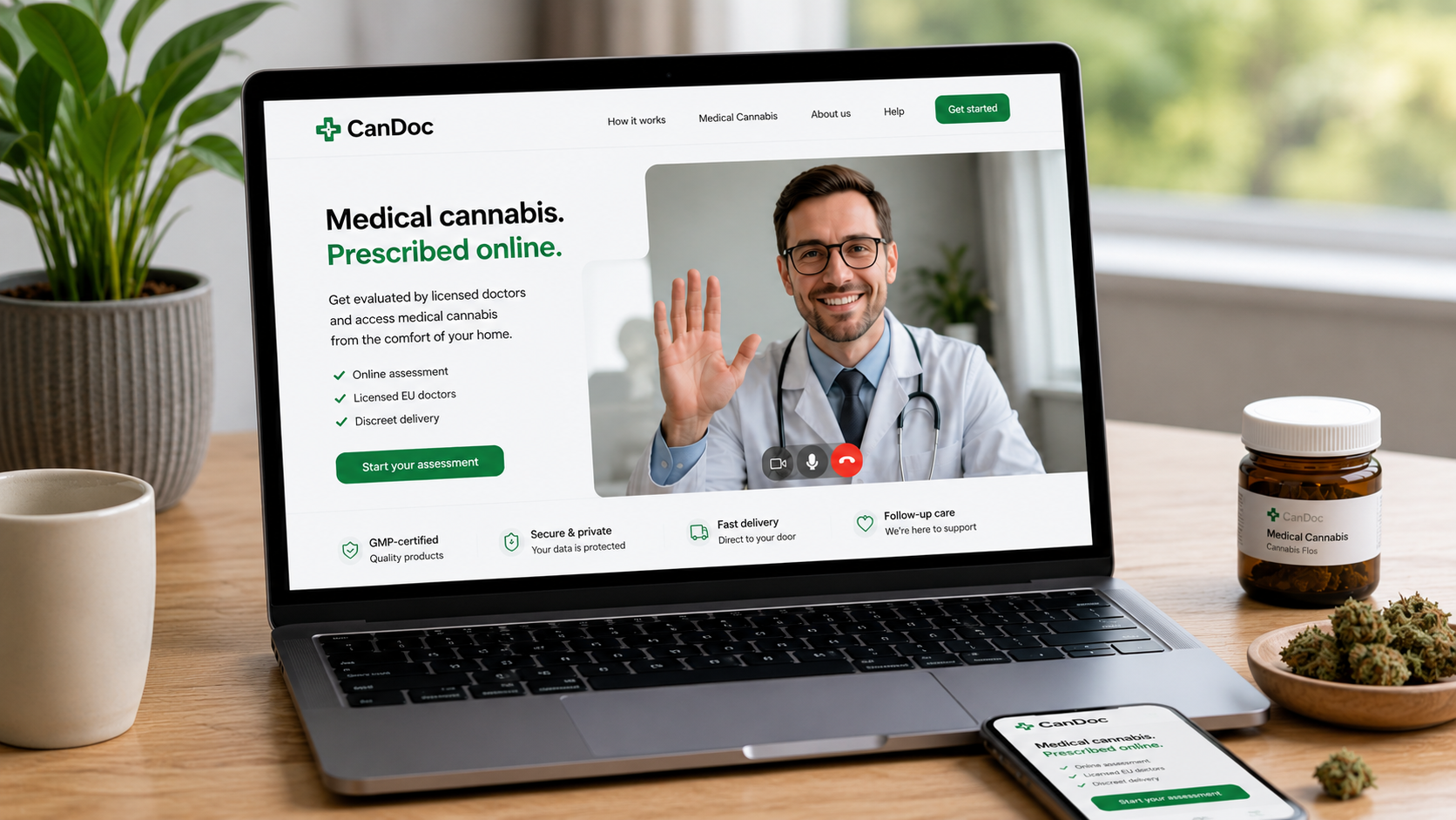 Modern home office setup featuring a laptop displaying the CanDoc online medical cannabis consultation platform, with a smartphone lying on the desk, medical cannabis container, and cannabis buds in soft natural lighting.