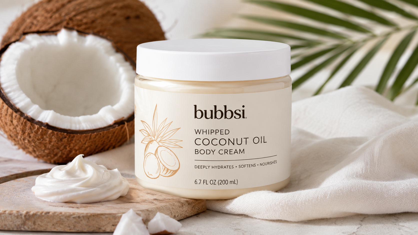 Bubbsi Whipped Coconut Oil Body Cream bottle with adorable animal-shaped silicone design for babies