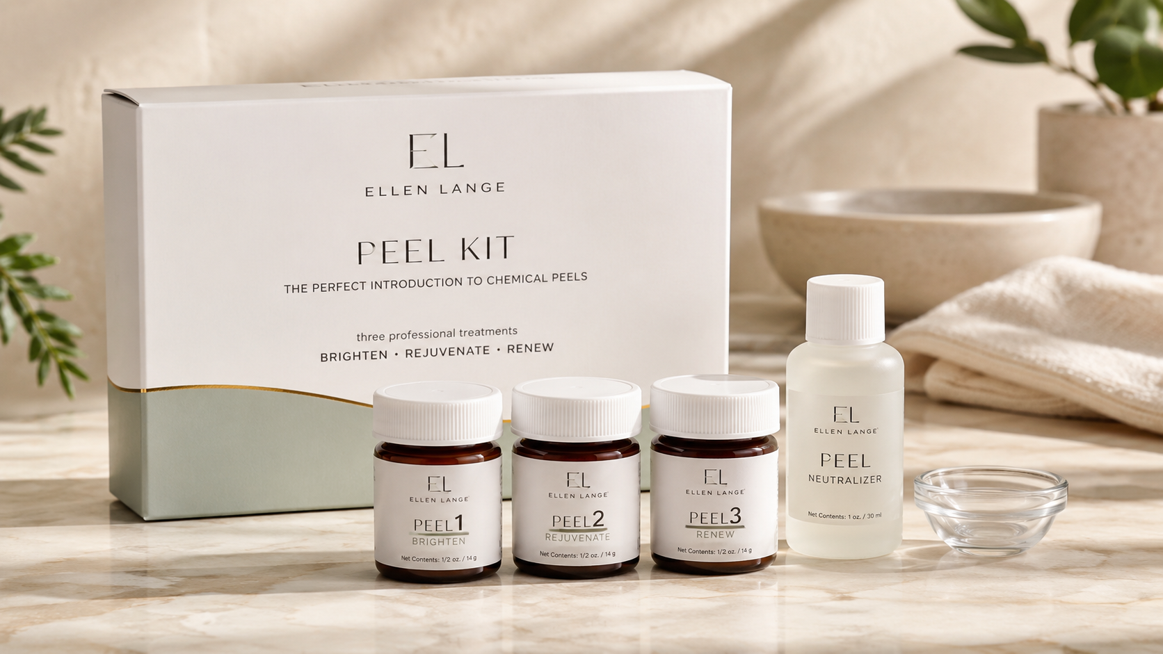 Ellen Lange Peel Kit with professional chemical peel jars, neutralizer, and skincare accessories displayed on a marble countertop in a spa-inspired setting for at-home skin rejuvenation.