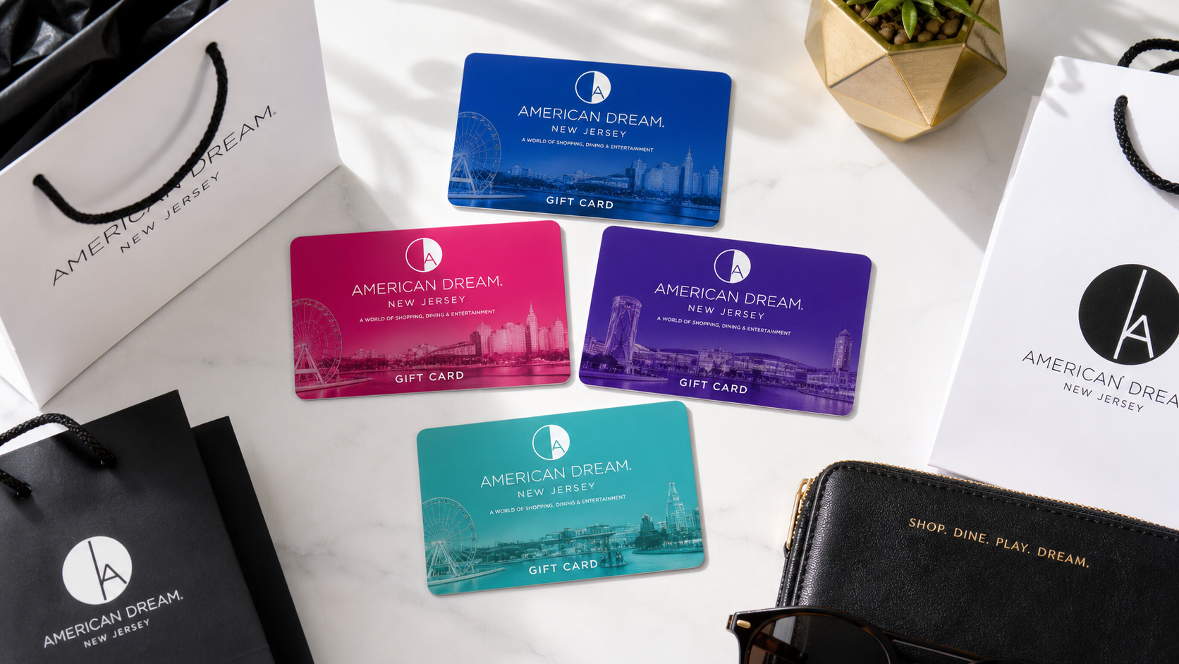 American Dream New Jersey gift card displayed with shopping bags and entertainment attractions